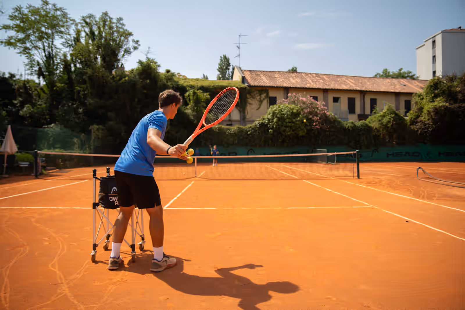 Maestro con allieva alla scuola tennis TCA